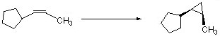 There is a scheme of a reaction. The reactant has a structure of a CC double bond. The first (from left to right) carbon has a five-carbon ring attached below the plane of the bond. The second carbon has a CH3 group attached to the second carbon below the plane of the double bond. The product has the following structure: a three-carbon ring, with a CH3 group bonded to the first carbon with a wedge and a five-carbon ring bonded to the second (clockwise) carbon with a wedge.
